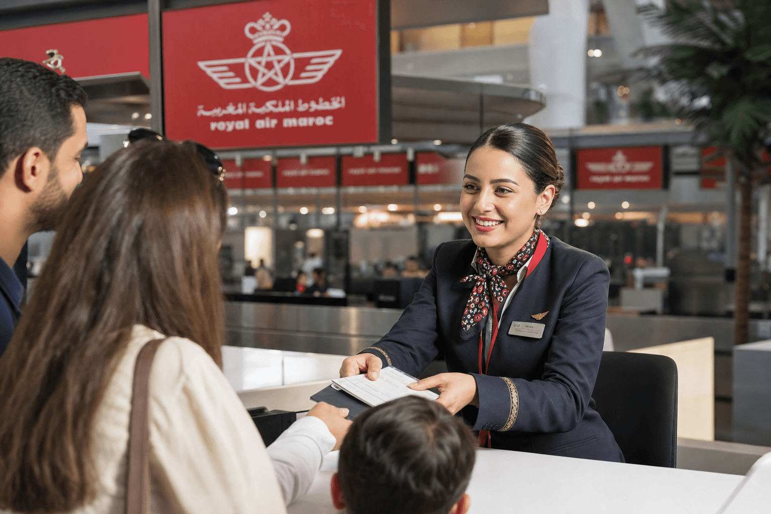 Moroccan airport welcome agent assisting a family with boarding passes, modern airport interior.